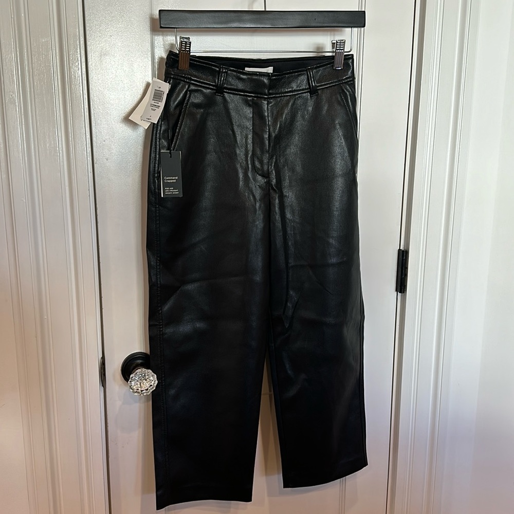 Babaton cropped faux, leather black pants. Mid rise Straight size  2 crop